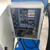 160-ton-press-electrical-cabinet-internal-wiring Internal view of the 160 ton press electrical cabinet, showing neat wiring, high-quality components, and safe circuit layout.