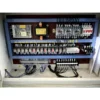 315-ton-hydraulic-press-electrical-control-panel-interior Interior view of the electrical control panel for the 315 ton four column hydraulic press, showing PLC, contactors, and safety wiring.