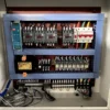 electrical-cabinet-inside-rubber-vulcanizing-machine Electrical cabinet interior of 160 ton hydraulic vulcanizing press, industrial control system for rubber and fiberglass molding machine